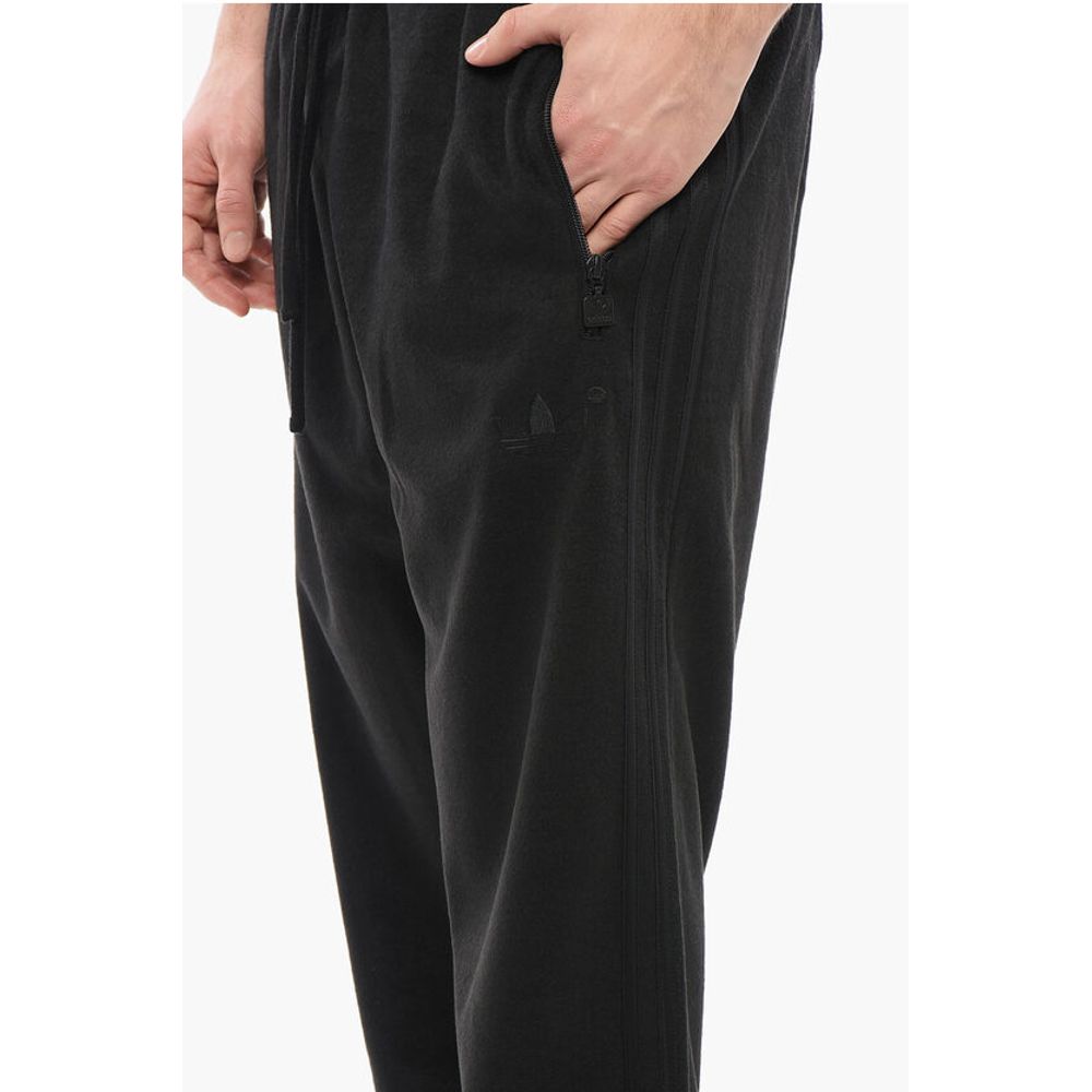 Adidas Joggerji iz volnene Blend z detajli v barvah