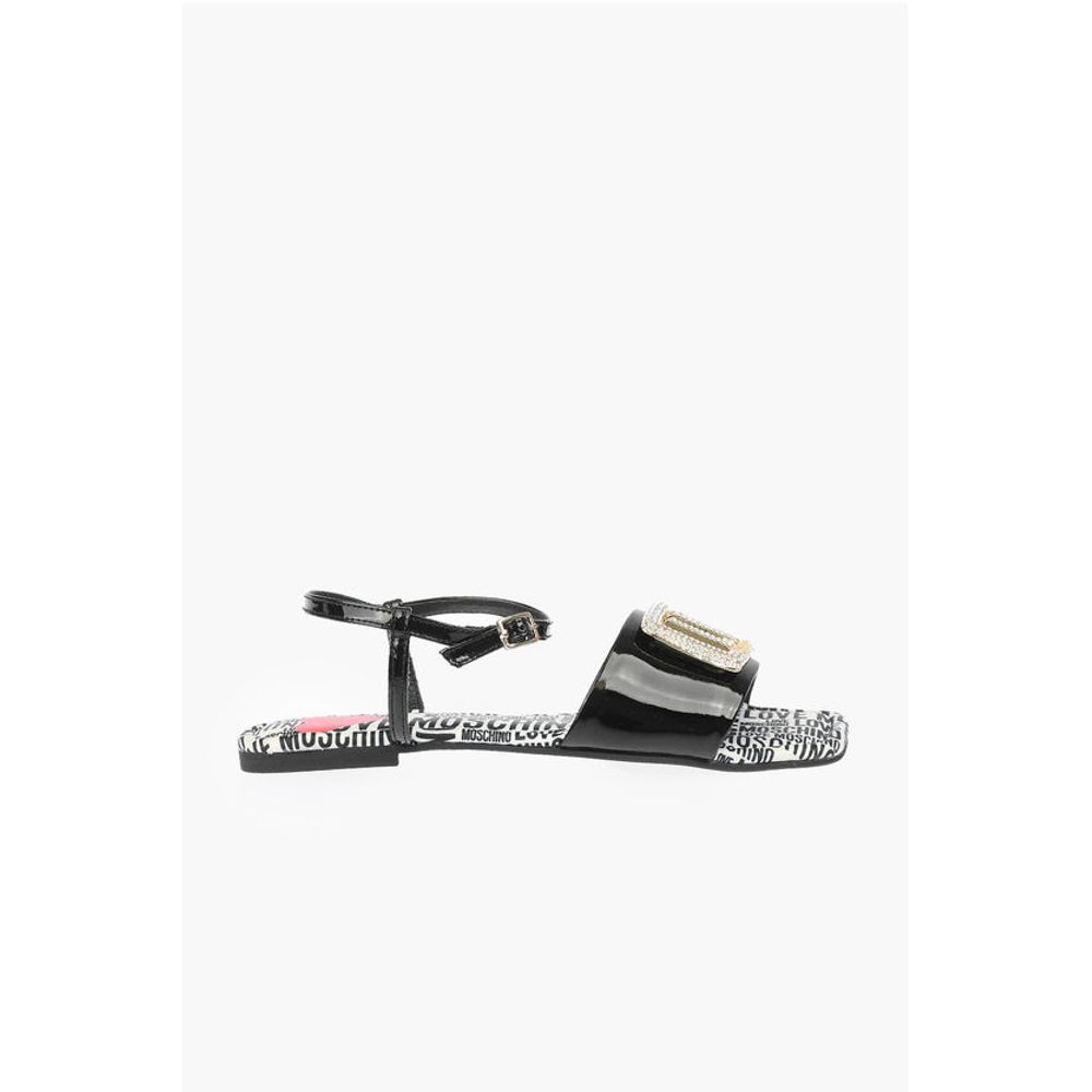 Moschino LOVE Patent Leather Flat Sandals with Logoed Jewel Detail